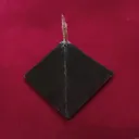 Черная свеча пирамида из воска. 