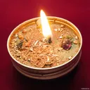 Денежная свеча с травами и камнями. 